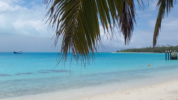Cocos Islands sea glass and white sand beach — Travel and Tide coastal lifestyle store Australia