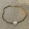 Cowrie Shell Beaded Necklace - styled shot | Travel & Tide