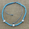 Coloured Shiva Shell Necklace - styled shot | Travel & Tide