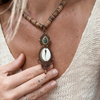 Cowrie & Labradorite Macrame Necklace - styled shot | Travel & Tide