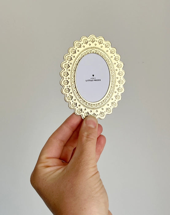 Oval Faux-tin frame - styled shot | Travel & Tide