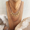 Brass Charm Necklace - detail view | Travel & Tide