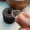 Silver Mandala Ring - styled shot | Travel & Tide