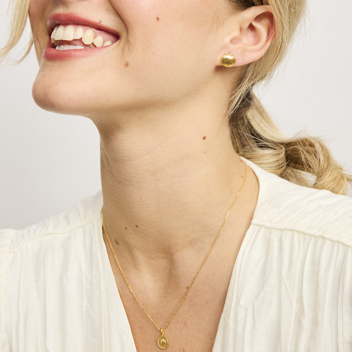 Scallop Shell Disc Pendant Necklace - Silver or Gold - styled shot | Travel & Tide