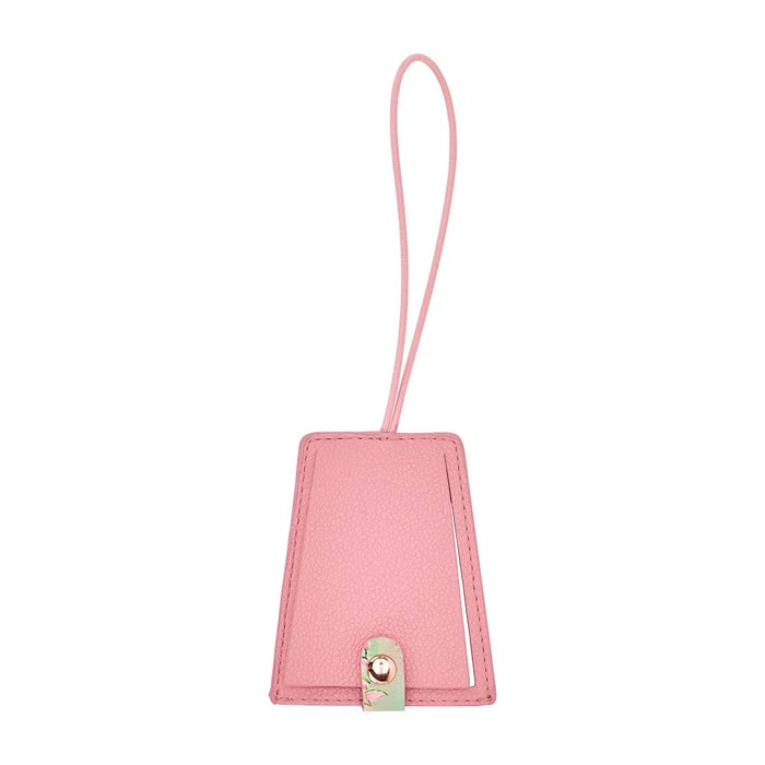 Tiki Island luggage tag with bold print and snap-close privacy flap - 9x7.5cm travel tag back view
