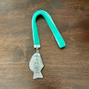 Handmade coastal Christmas hanger with turquoise velvet ribbon and silver fish charm

