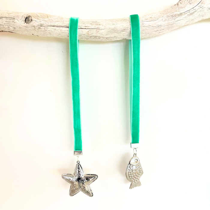 Coastal velvet Fish and Star hangers styled on a Christmas tree with coastal festive decorations
