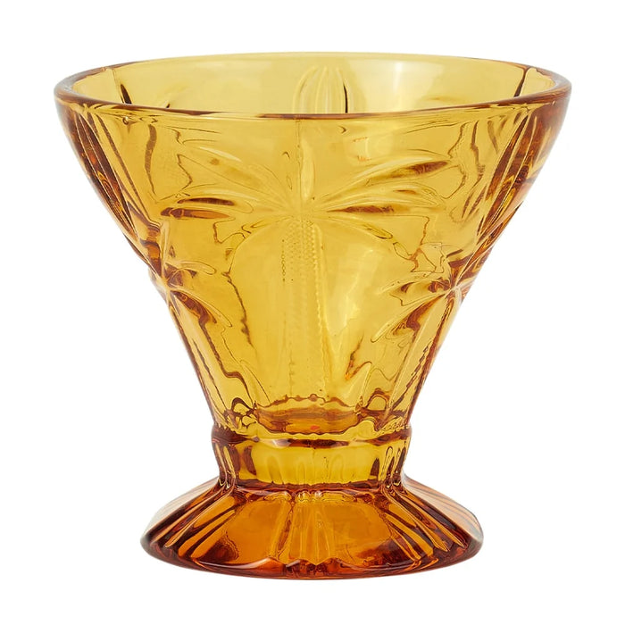 Set of 4 amber etched palm tree cocktail glasses styled for summer entertaining
