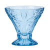 Set of 4 blue etched palm tree cocktail glasses on a coastal table setting
