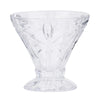 Set of 4 clear etched palm tree cocktail glasses on a styled table
