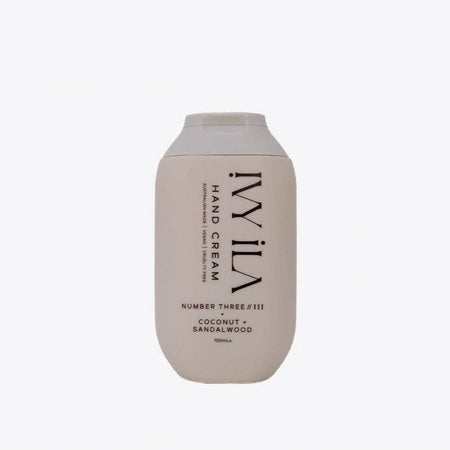 IVY ILA No. III hand cream styled with coastal accessories — coconut sandalwood scent, vegan and cruelty-free
