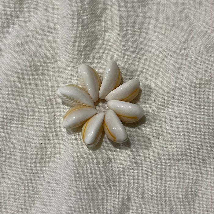 Small white cowrie shell flower charm on linen - Travel and Tide Coastal Notions
