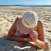Person wearing the Down Under Delights embroidered corduroy hat outdoors
B