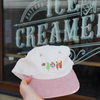 Person wearing the Down Under Delights embroidered corduroy hat outdoors
