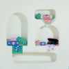 3 Fiesta style Safe Keeper hard‑shell cases in assorted designs - compact, protective storage for small valuables.