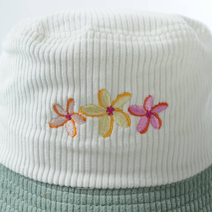 Close-up of embroidered flower detail on Flower Bloom corduroy bucket hat
