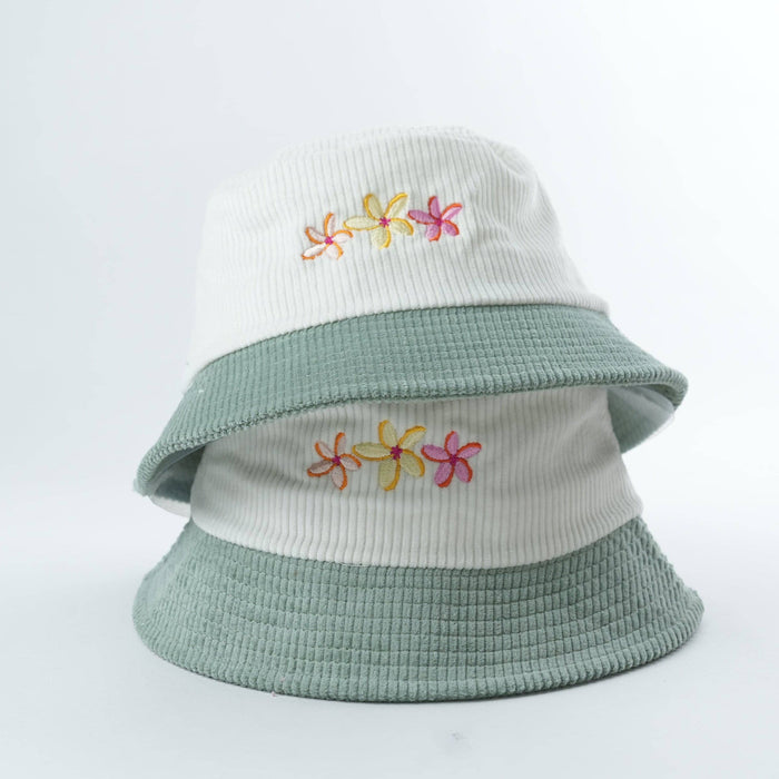 Two Flower Bloom corduroy bucket hats shown together
