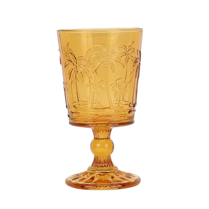 Set of 4 amber etched palm tree goblet glasses styled for summer entertaining
