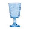 Set of 4 blue etched palm tree goblet glasses on a coastal table setting
