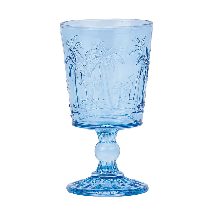 Set of 4 blue etched palm tree goblet glasses on a coastal table setting
