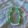 Turquoise polymer clay bead anklet with gold-tone rings and white shell beads on adjustable white cord
