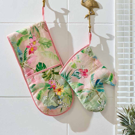Tiki print linen oven mitt in use in kitchen - Australian made cooking accessory
