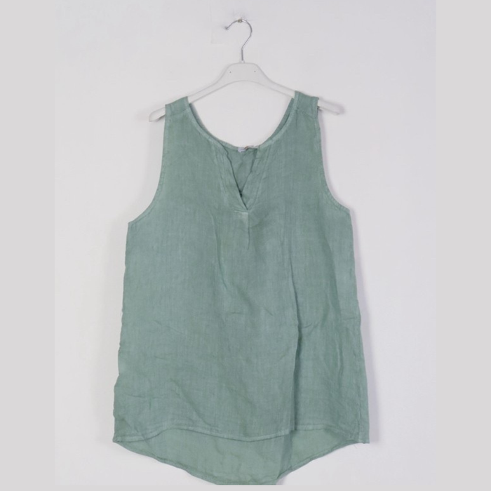 100% linen tank top in duck green with notched V-neck and front pleat worn by model
