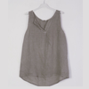 100% linen tank top in taupe with notched V-neck and front pleat on hanger
