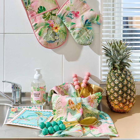 Tiki print linen tea towel draped in kitchen - absorbent linen cotton tea towel
