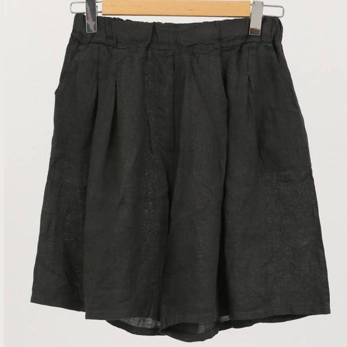 100% linen wide-leg Bermuda shorts in charcoal grey with front pleats and patch pockets on hanger
