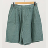 100% linen wide-leg Bermuda shorts in duck green with front pleats and patch pockets on hanger
