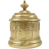 Gold resin palm tree canister with domed lid and embossed palm motif on white background
