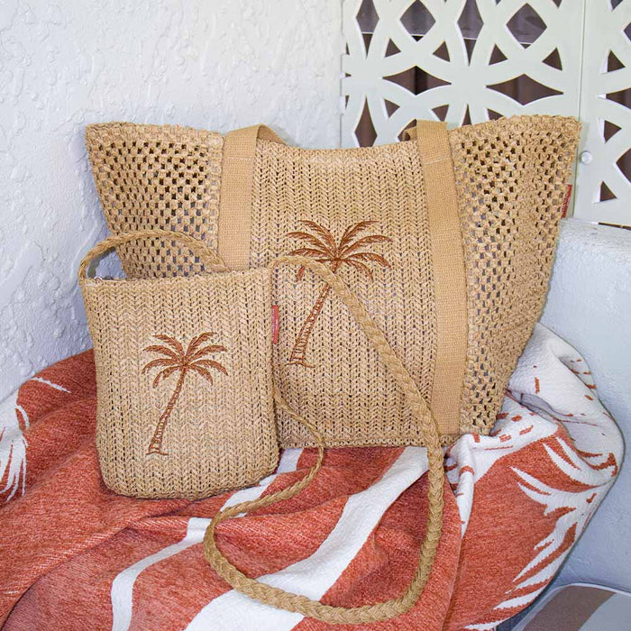 Close-up of natural paper crochet texture on palm cross body pouch with tote
