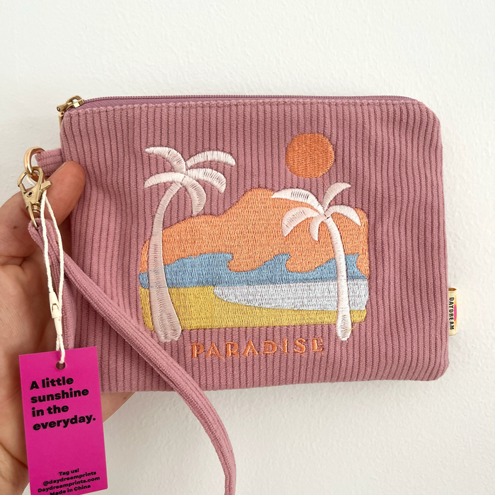 Close-up of Paradise embroidery detail on soft mauve corduroy wristlet pouch by Daydream Prints
