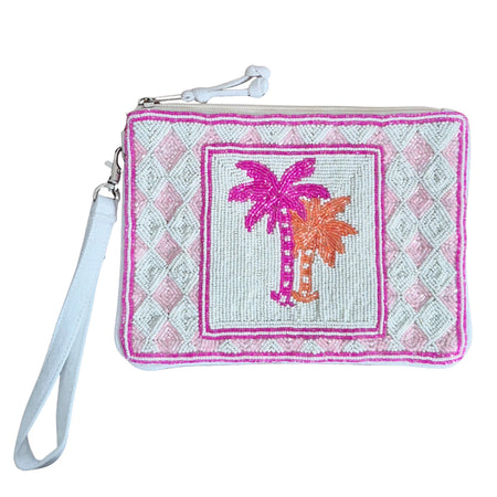 Beaded wristlet bag with pink and peach palm trees, a pale pink and white diamond border, zip closure and white wrist strap
