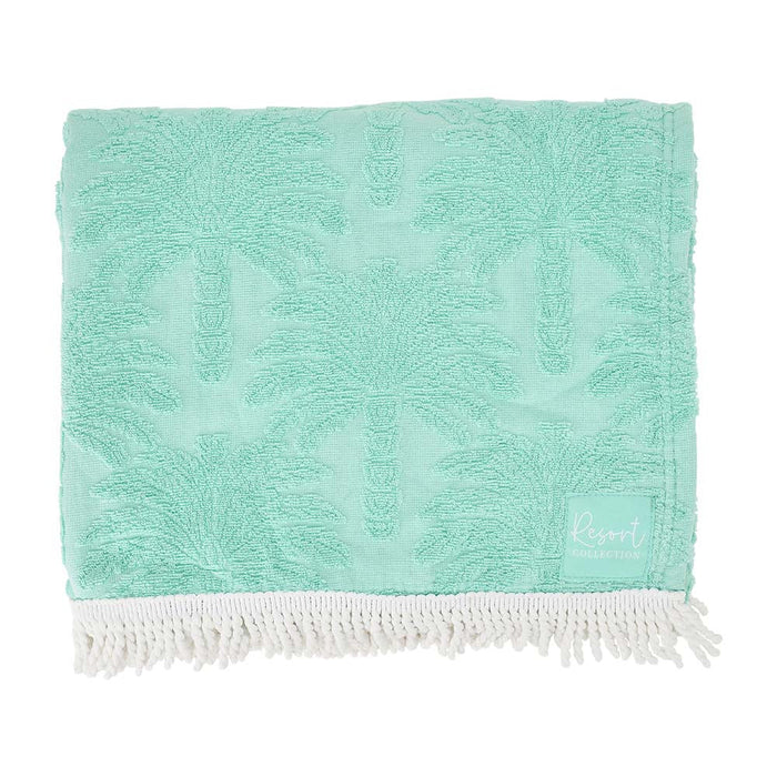 Resort Towel Mint Palm - 100% cotton terry with tonal palm jacquard and white fringe trim folded