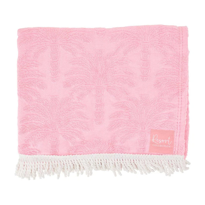 Resort Towel Pink Palm - 100% cotton terry with tonal palm jacquard and white fringe trim folded
