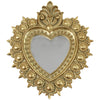 Gold baroque resin sacred heart wall mirror with ornate beaded surround and convex mirror insert on white background
