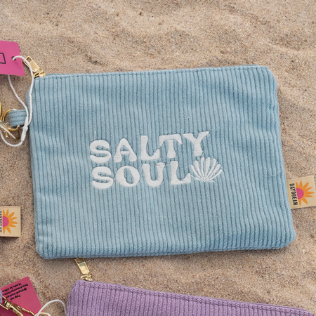 Close-up of Salty Soul wave and sunset embroidery detail on soft seafoam corduroy wristlet pouch by Daydream Prints
