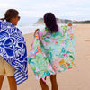 Sand free Tiki towel drying on hook using elastic strap loop - quick-dry microfibre beach towel
