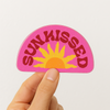 Sunkissed retro sun vinyl sticker with bold sunrise over pink sky — waterproof decal for water bottles and laptops
