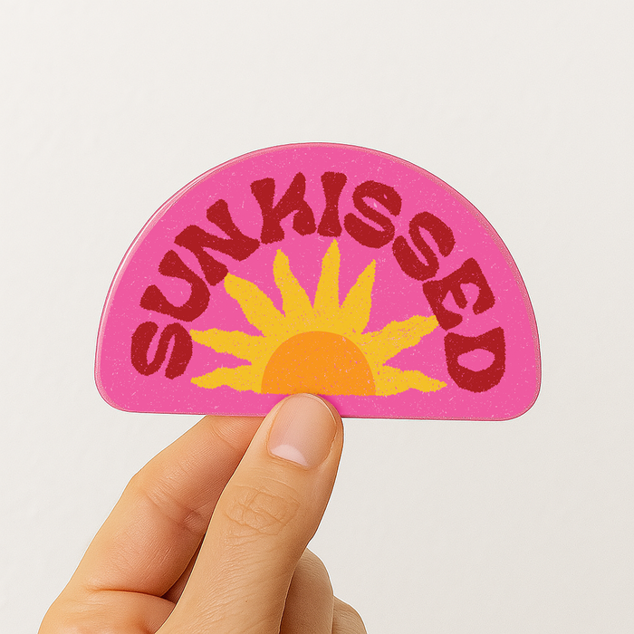 Sunkissed retro sun vinyl sticker with bold sunrise over pink sky — waterproof decal for water bottles and laptops
