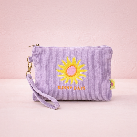 Sunny Days embroidered corduroy wristlet zip pouch in soft lavender with bold sun embroidery and detachable wristlet strap
