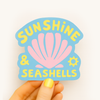 Sunshine and Seashells waterproof vinyl sticker in pastel pink, sky blue and yellow with retro seashell illustration
