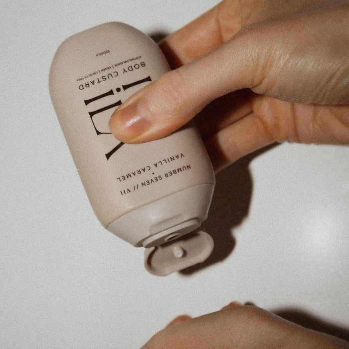 IVY ILA No. VII vanilla caramel body custard jar open showing whipped texture — vegan cruelty-free body lotion
